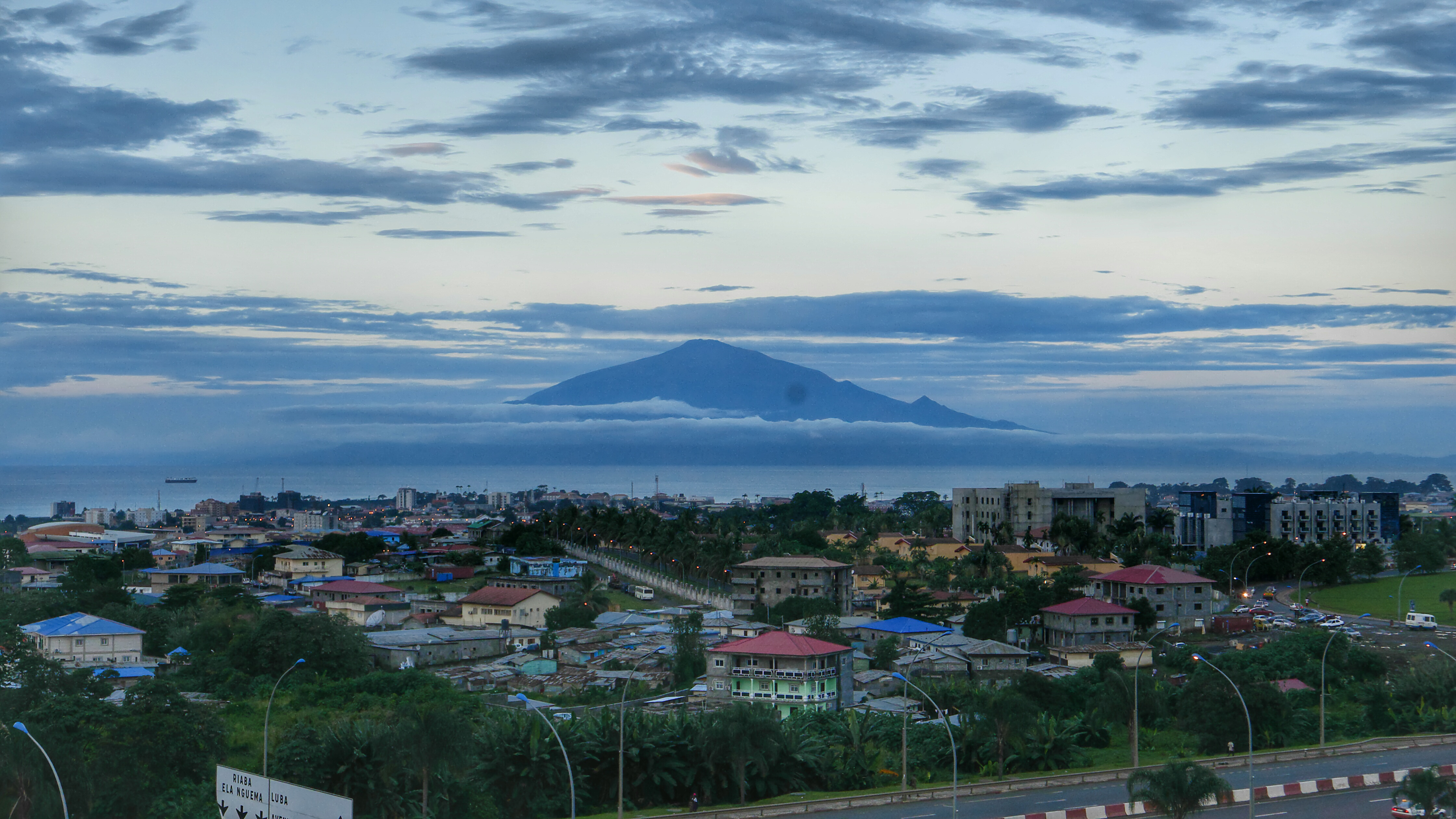 Cityscape of Malabo. Photo credit: Diego https://stock.adobe.com/uk/search?filters%5Bcontent_type%3Aphoto%5D=1&filters%5Bcontent_type%3Aillustration%5D=1&filters%5Bcontent_type%3Azip_vector%5D=1&filters%5Bcontent_type%3Avideo%5D=1&filters%5Bcontent_type%3Atemplate%5D=1&filters%5Bcontent_type%3A3d%5D=1&filters%5Bcontent_type%3Aimage%5D=1&k=malabo&order=relevance&safe_search=1&limit=100&search_page=1&search_type=pagination&acp=&aco=malabo&get_facets=0&asset_id=322355192 Featured image