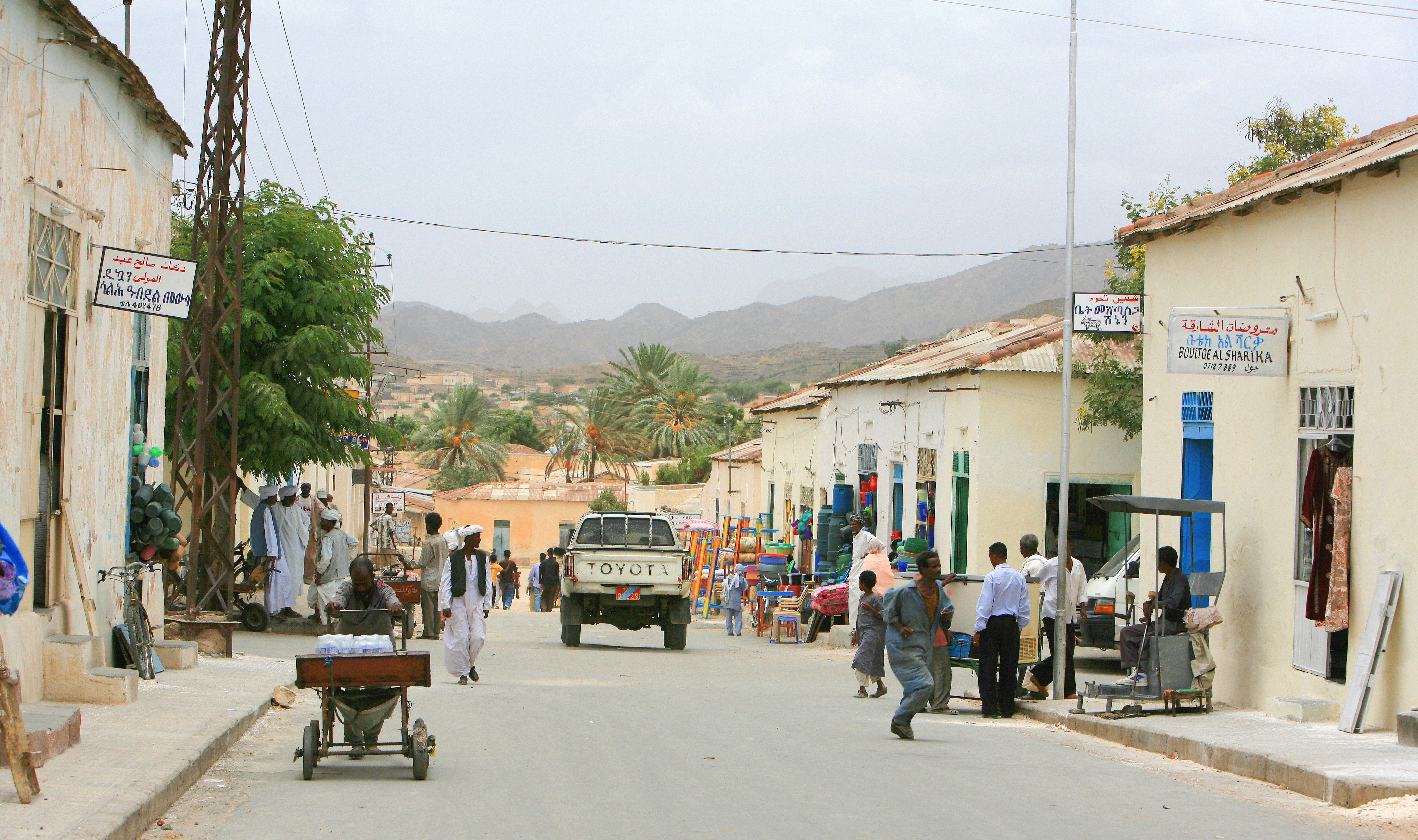 Keren, Eritrea. Photo credit: JordiStock, https://www.istockphoto.com/photo/local-villagers-and-customers-in-keren-market-eritrea-gm1143093649-306857587 Featured image