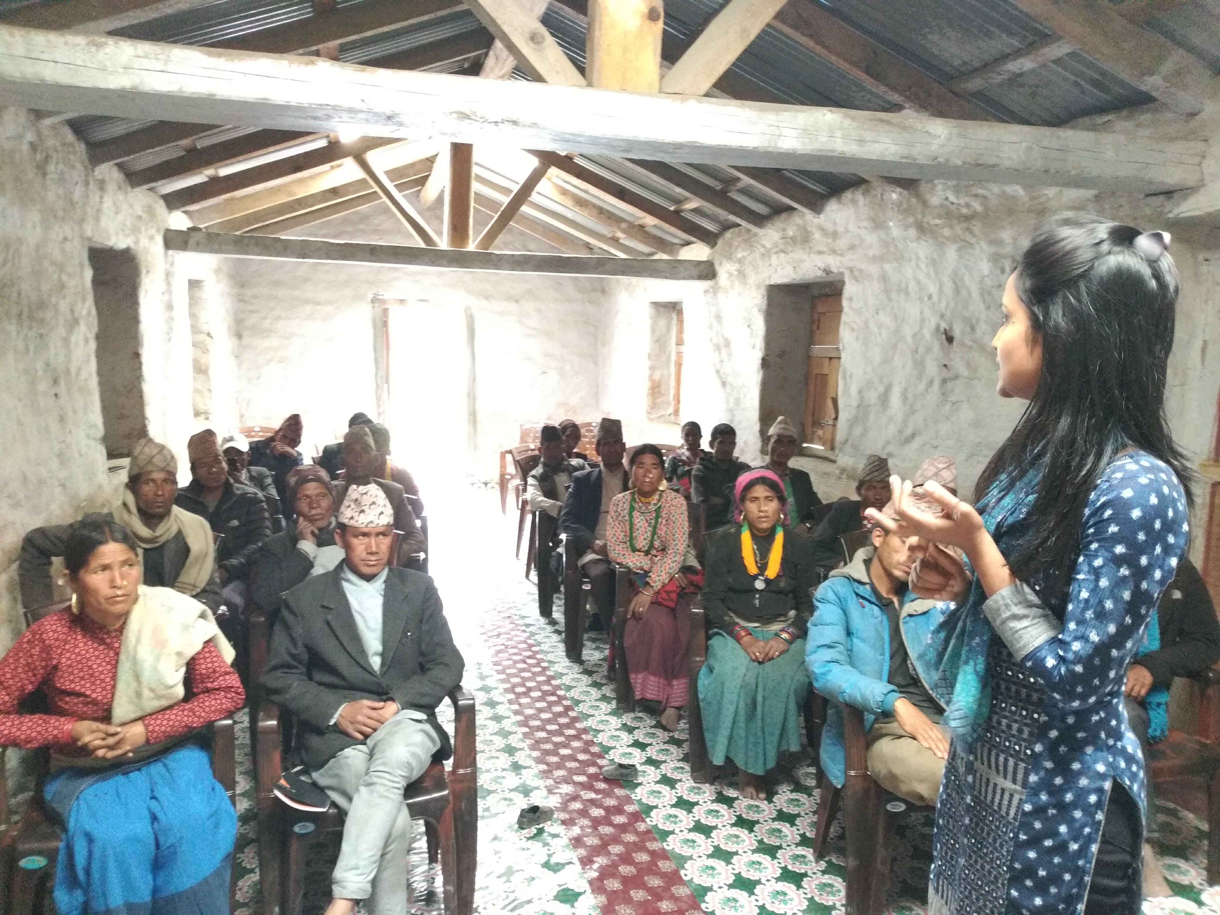 A mentor of International IDEA’s Coherence programme explaining the elected representatives of a Adanchuli Gaunpalika (rural municipality) of Nepal’s Karnali Province about the importance of their Gaunpalika’s strategic vision in annual planning.  Photo credit: International IDEA